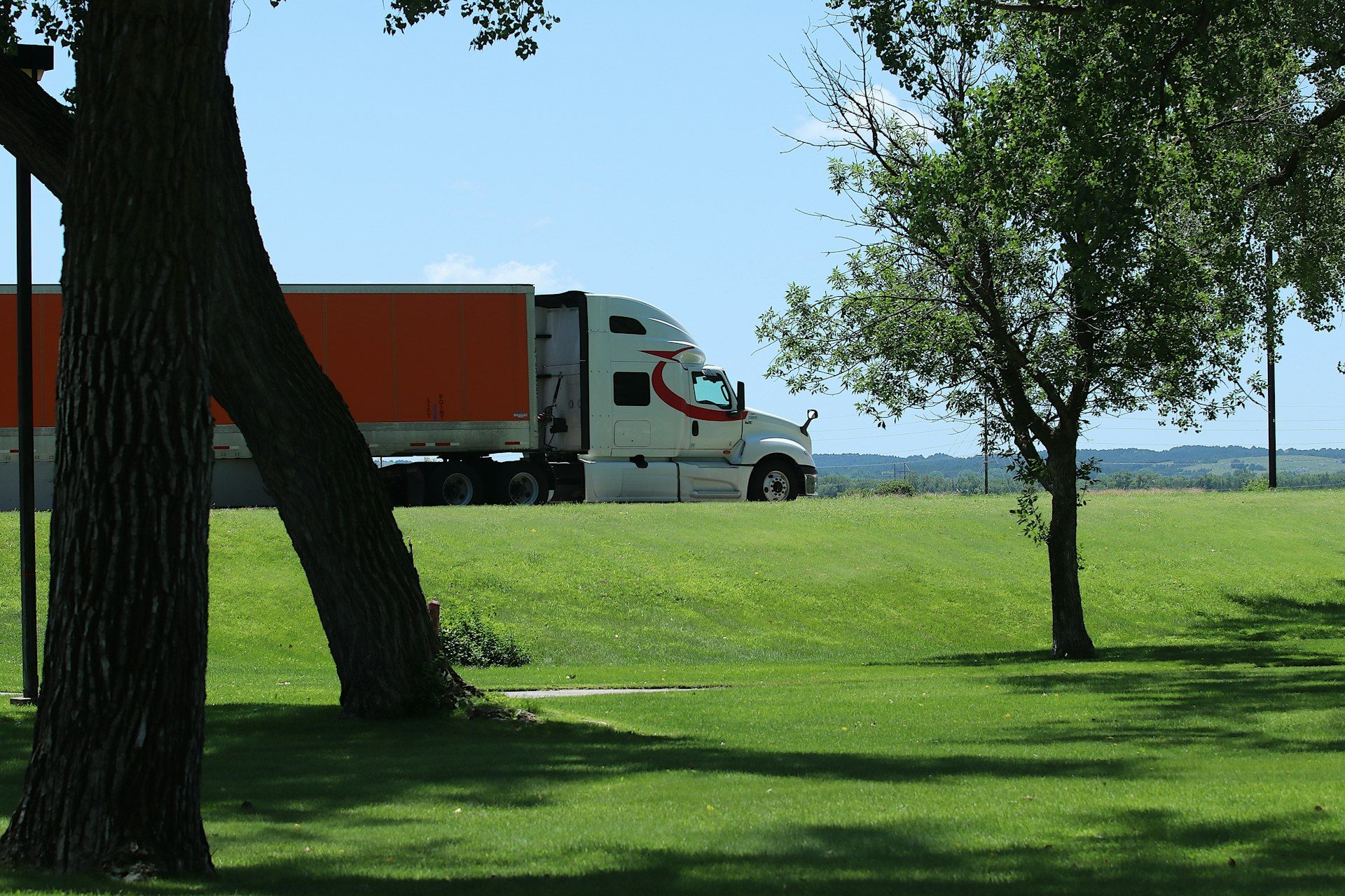 New Link Express Class-8 tractor and dry-van trailer on the open highway